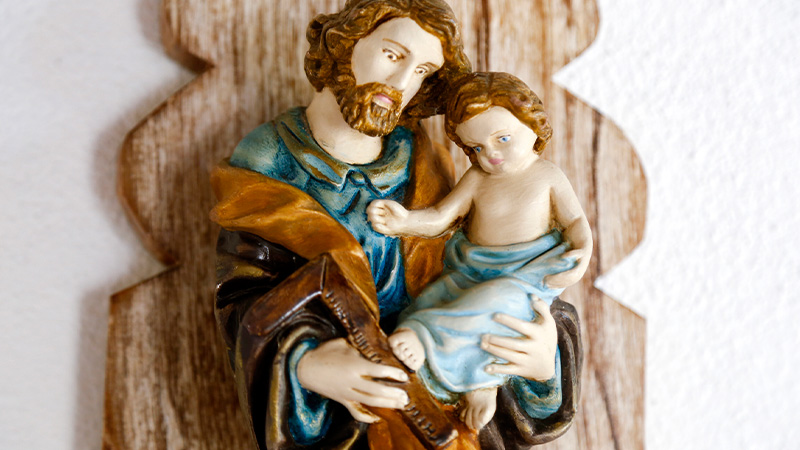 A figure of St. Joseph carrying baby Jesus