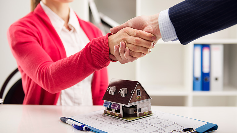 Image of 2 people handshaking